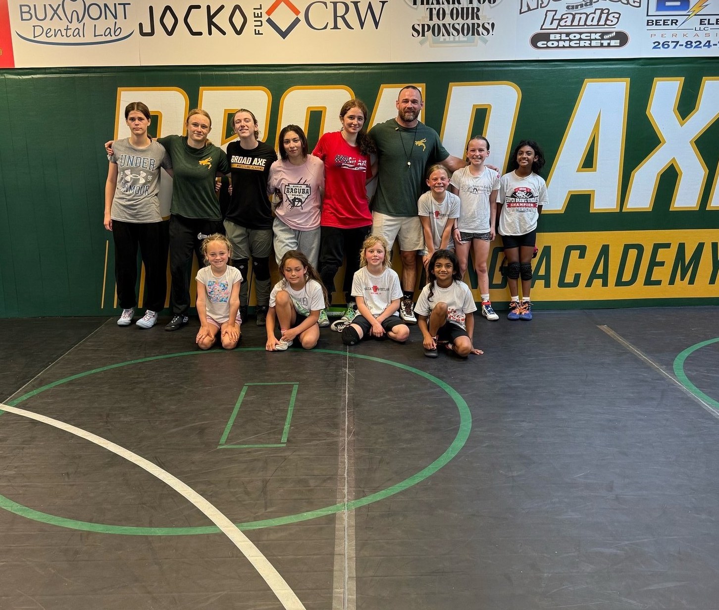 Broad Axe girls team in the room